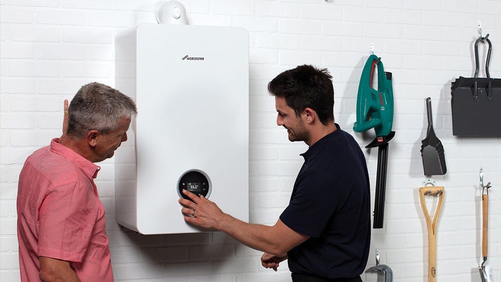 Gas Safe heating engineer carrying out an annual boiler service